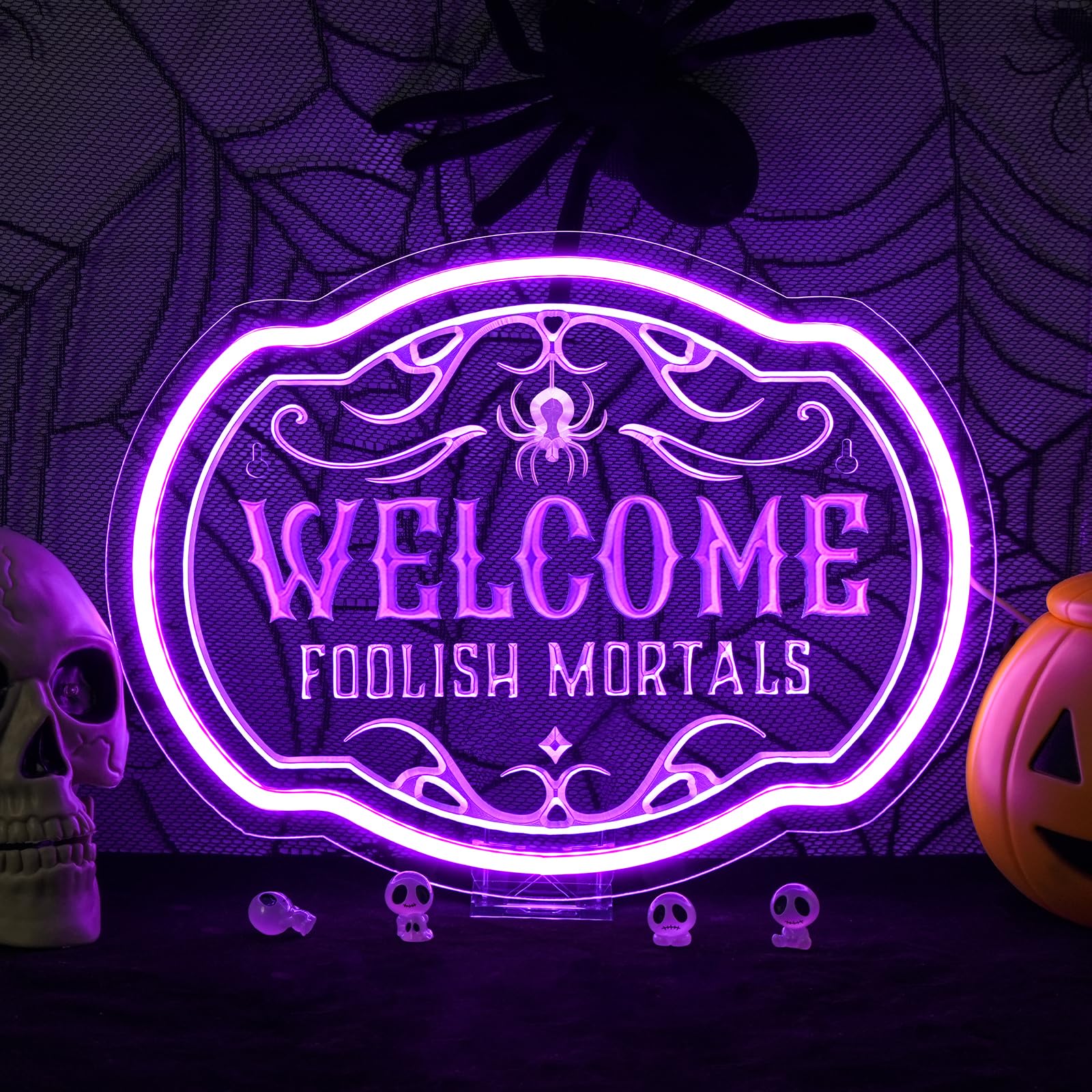Horseneon Welcome Foolish Mortals sign front-lit for spooky entryway ambiance.