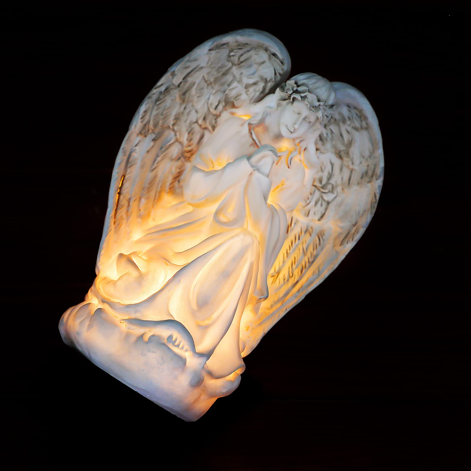 Hortsun cemetery garden angel decoration with serene nighttime glow.