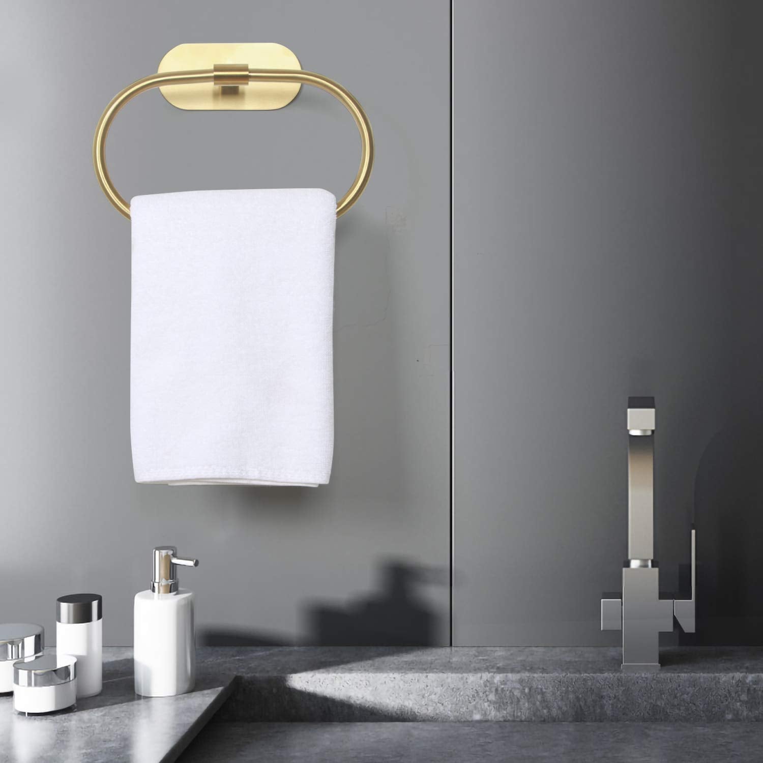Close-up of stainless steel brushed gold towel ring showing durable finish and clean lines.