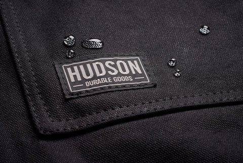 Hudson Durable Goods waxed canvas apron adjustable straps for a secure XXL-compatible fit.
