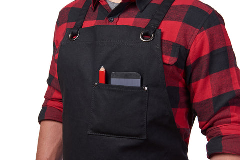 Hudson Durable Goods waxed canvas apron water-resistant surface protects clothing from spills.