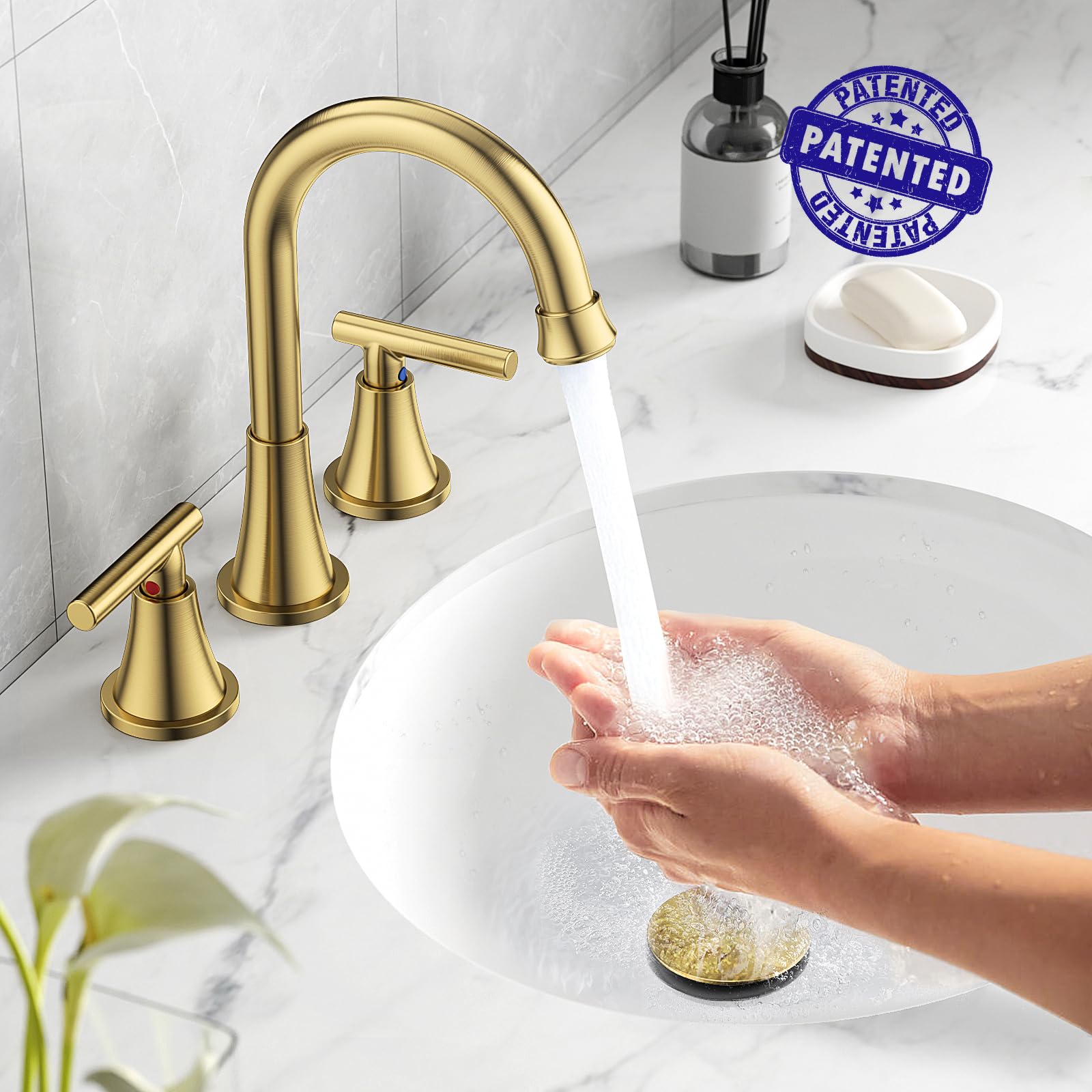 Hurran brushed gold faucet with 90 degree levers for precise control.
