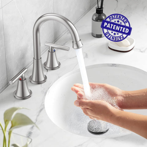 Hurran brushed nickel faucet levers offer precise temperature control.