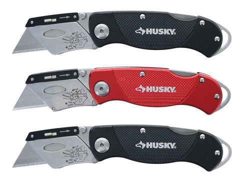Husky folding knife with three included blades ready for use.