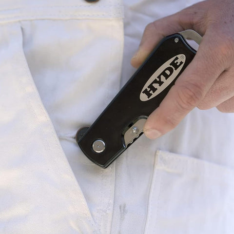 Hyde dual blade folding painter's tool folded safely for pocket storage.