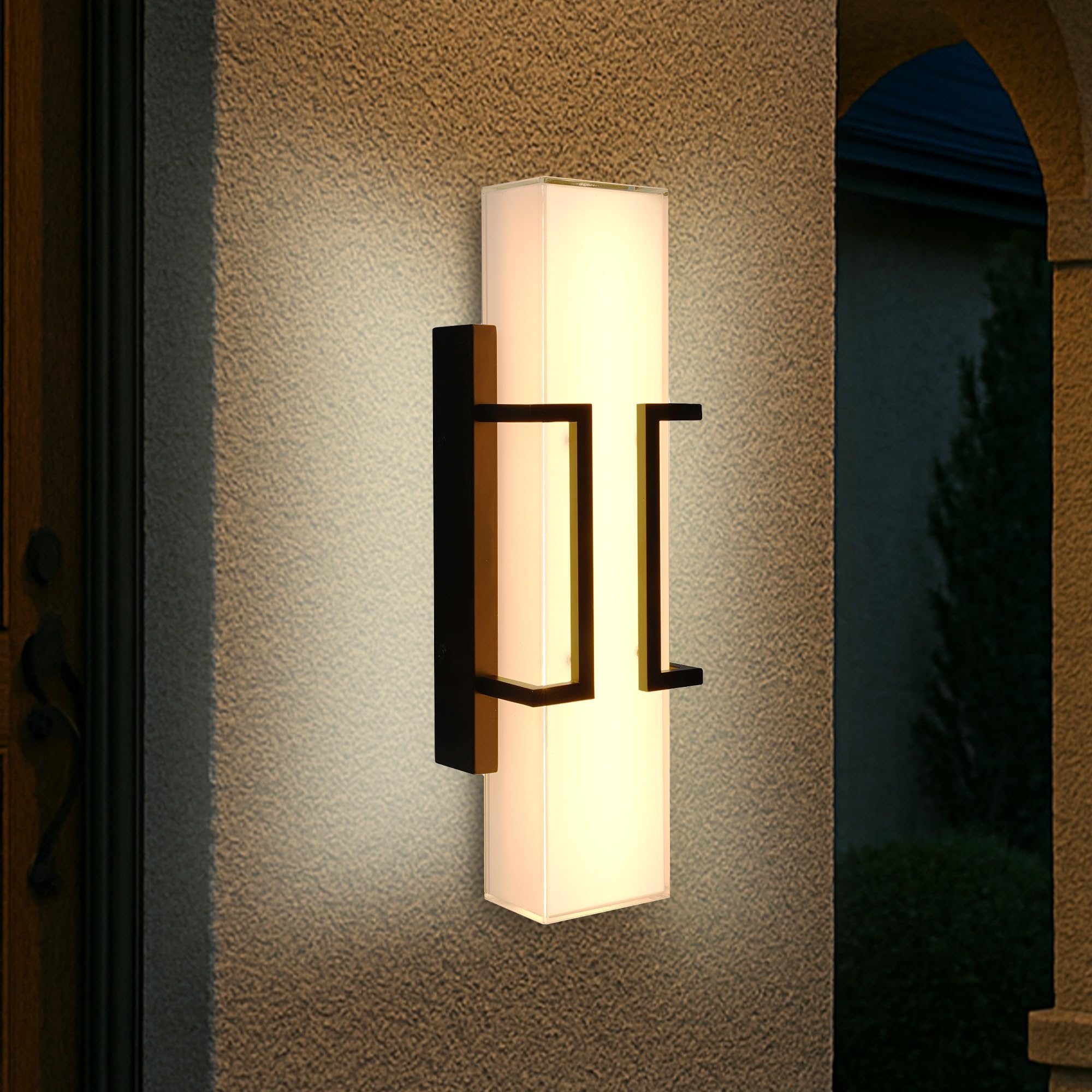 Hyunbae 16-inch sconce with clear glass enhances nighttime curb appeal and visibility.