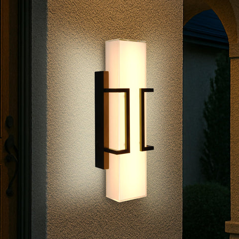 Hyunbae 16-inch sconce with clear glass enhances nighttime curb appeal and visibility.