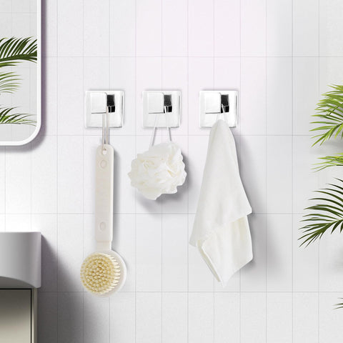 IBosins polished chrome robe and coat hooks in a modern setup.