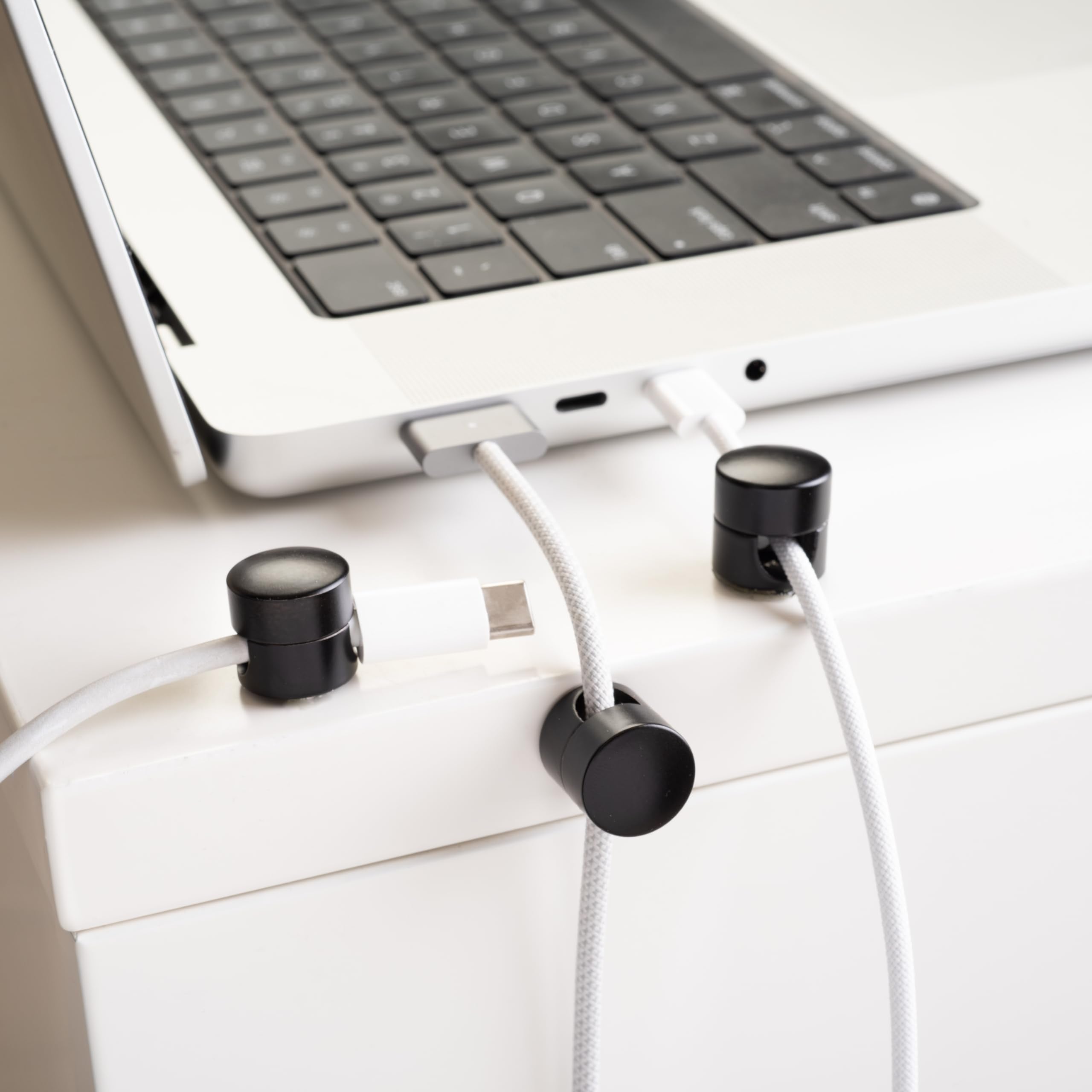 Close-up of the premium aluminum finish on ICONIT Cable Anchors.