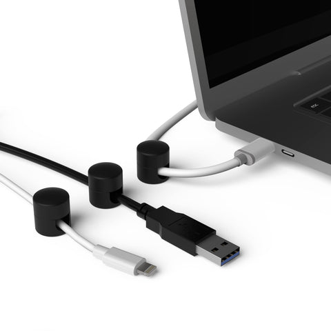 ICONIT Cable Anchors in black enhance desk organization and style.