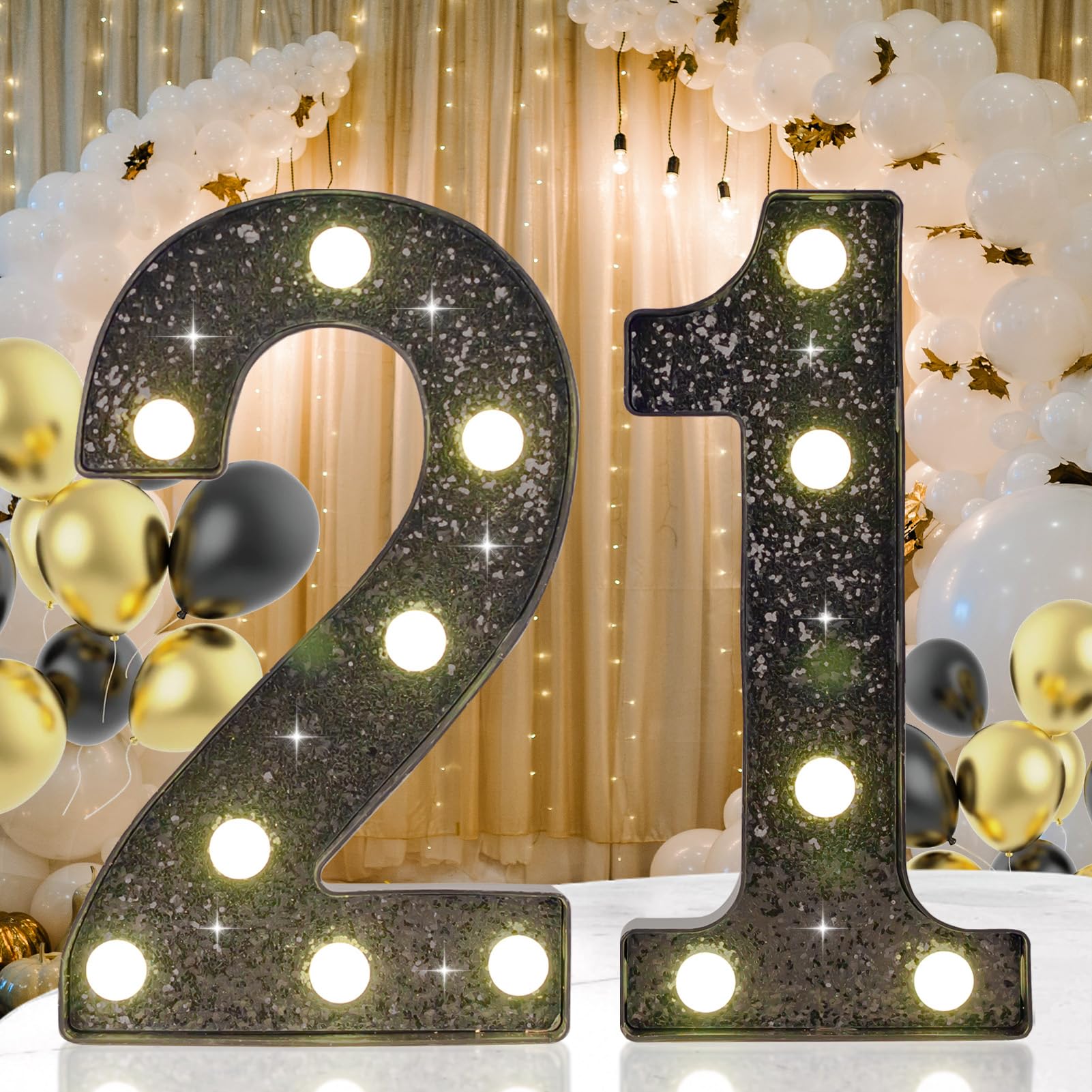 IFDGCTK 21st birthday LED light with black glitter finish for a dramatic centerpiece.