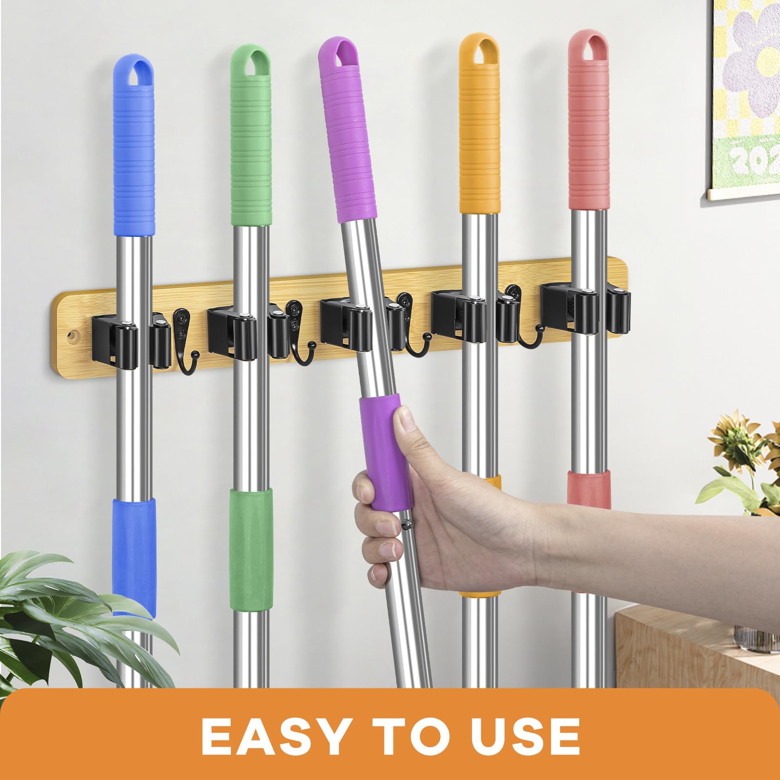 IMILLET rubber roller grip on broom hanger securely holds handles.