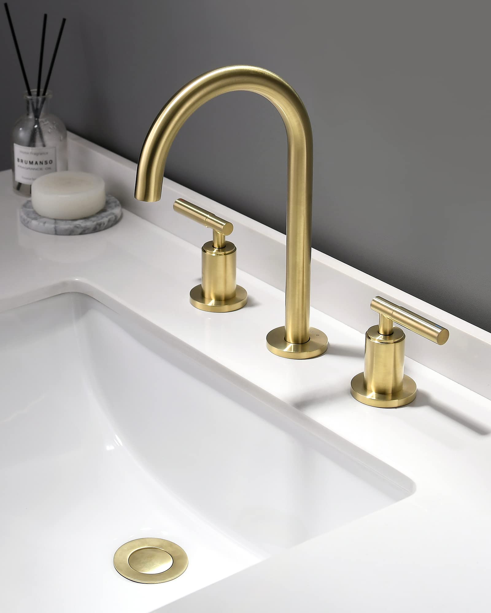 Indare brushed gold faucet with 360° swivel spout for versatile washing.