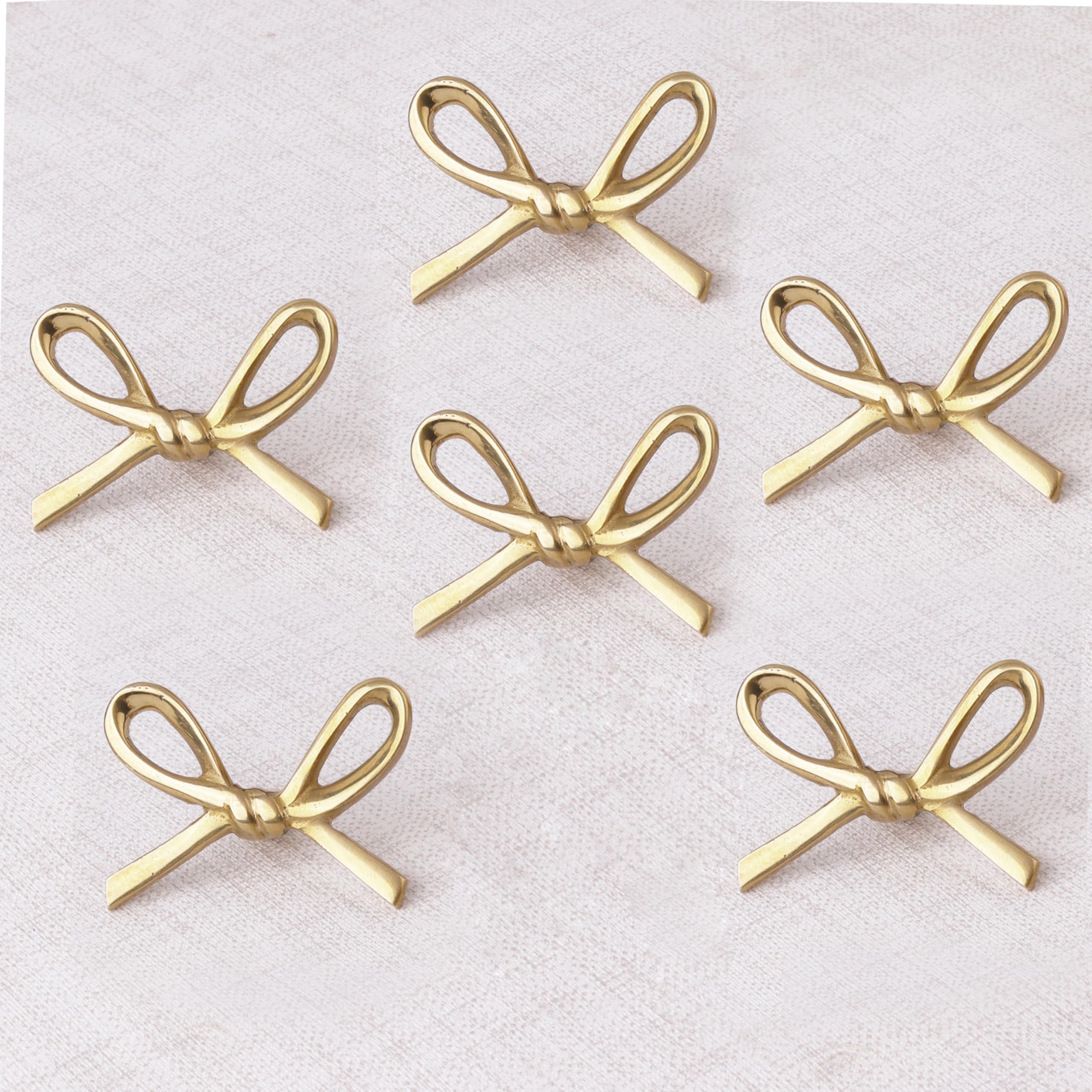 Indian Shelf brass gold bow knob closeup highlights premium finish for cabinets