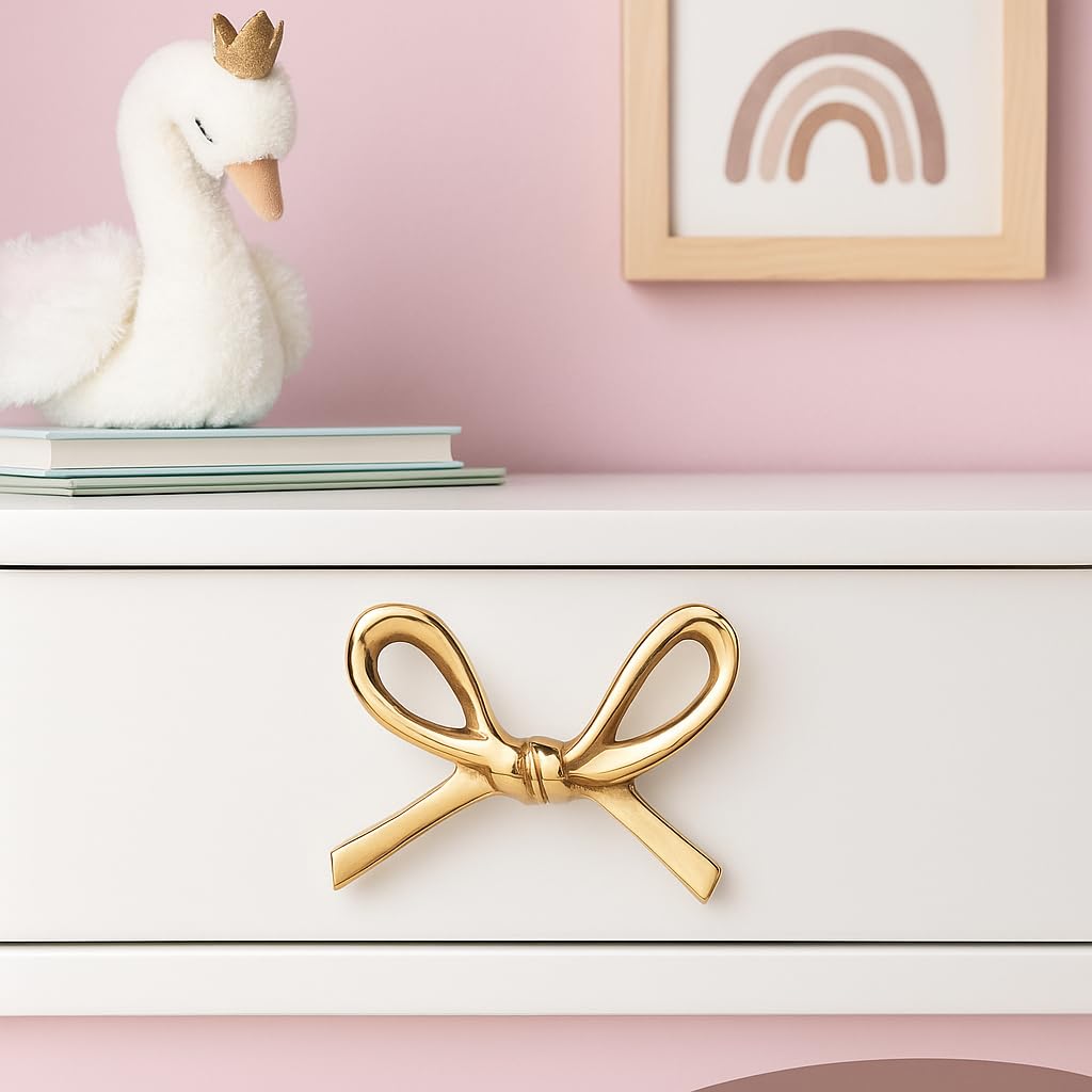 Indian Shelf brass gold bow knob detached view showcases thick, long-lasting hardware