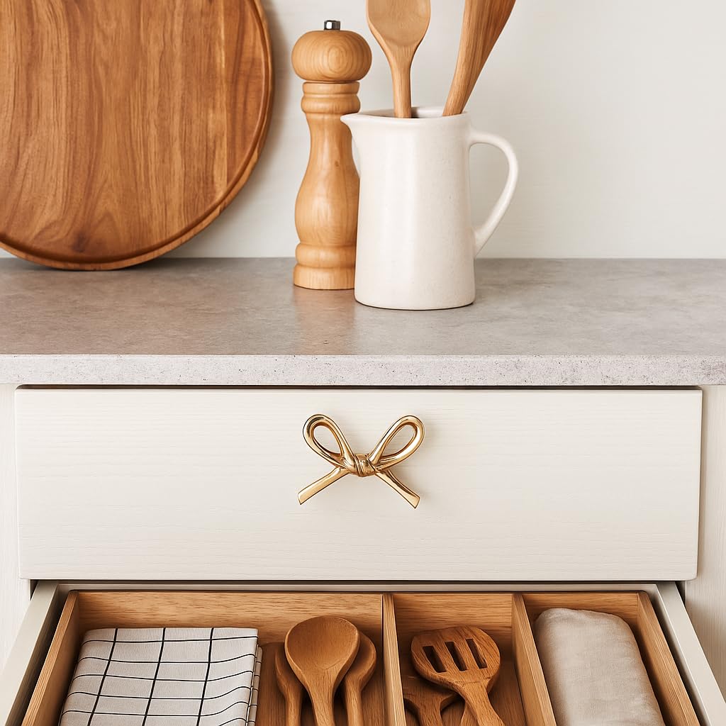 Indian Shelf brass gold bow knob in kitchen scene suggests premium upgrade for drawers