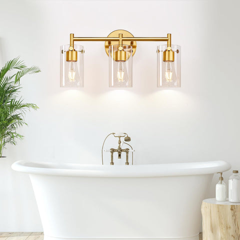 Indoi closeup of the brushed gold finish on a 3-light vanity fixture