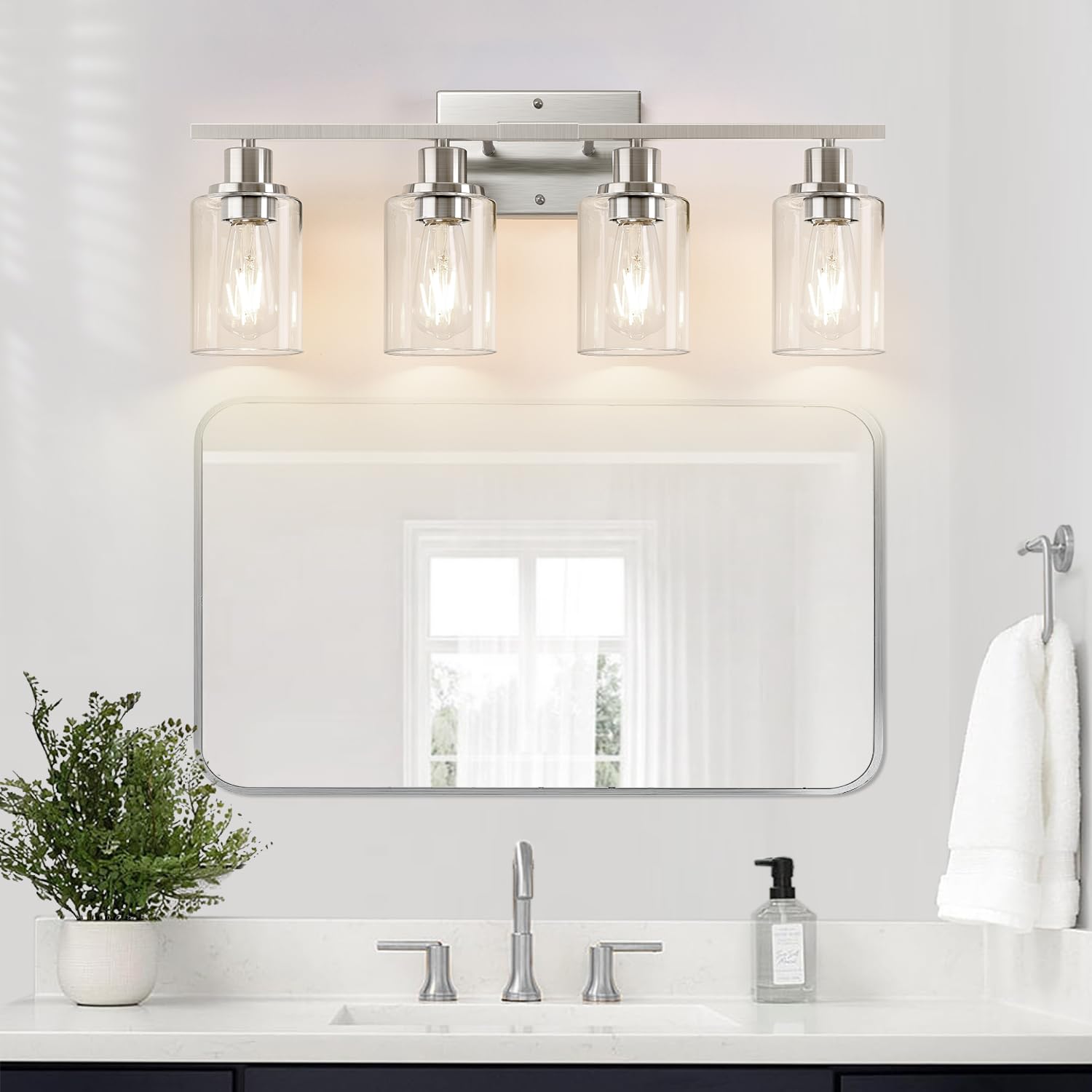 Indoi vanity light shown mounted up or down to fit your space.