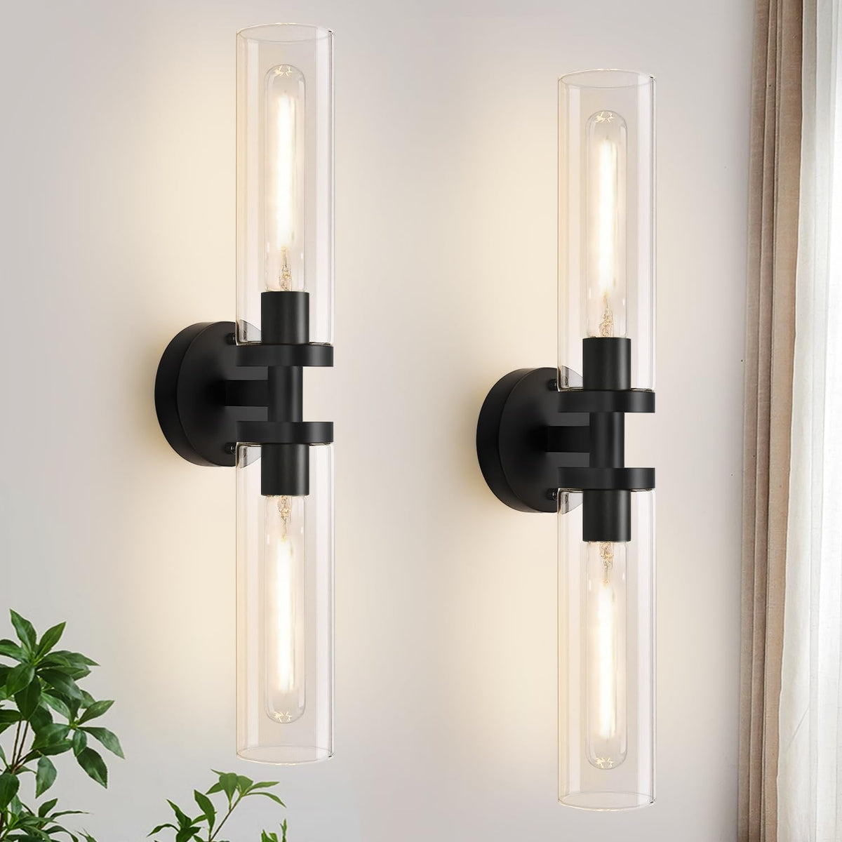 Indoi wall sconce set with two matte black fixtures for versatile bathroom or hallway lighting.