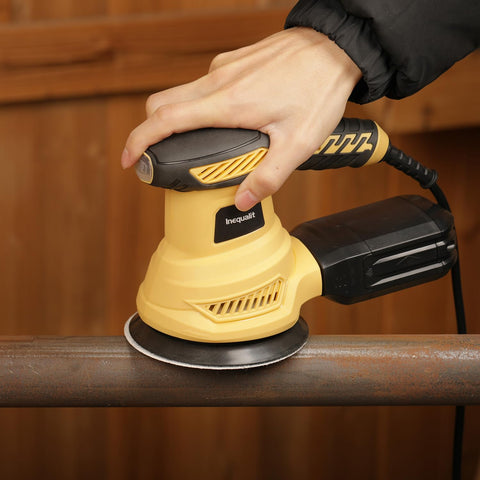 Inequalit Random Orbital Sander compact corded palm sander in use.