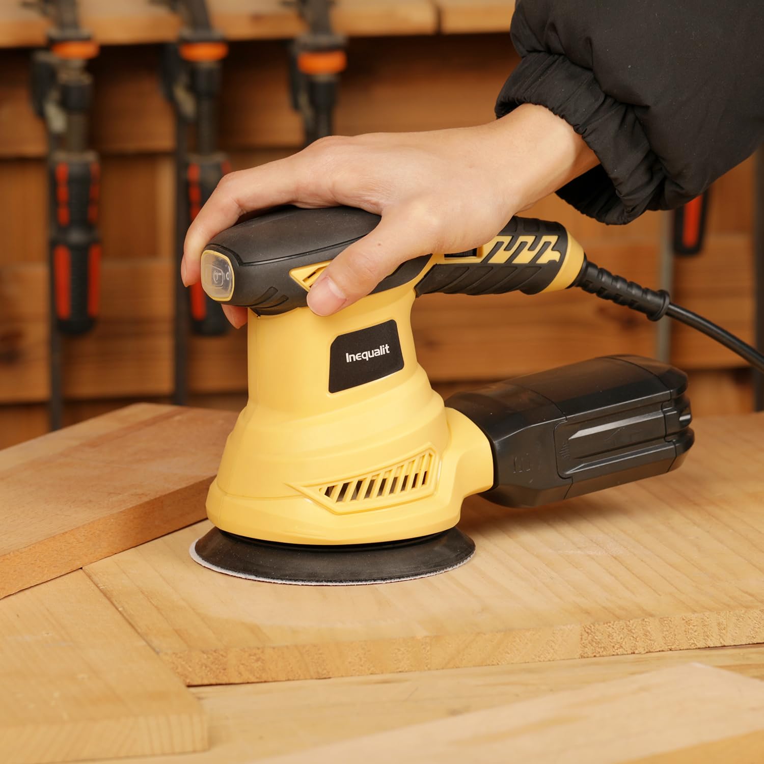 Inequalit Random Orbital Sander ideal for wood, metal, and plastic smoothing.