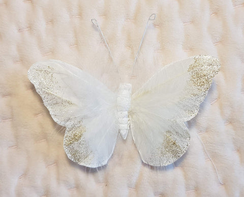 Inspired by Jewel large butterfly decor creates a dramatic focal point in a bedroom.