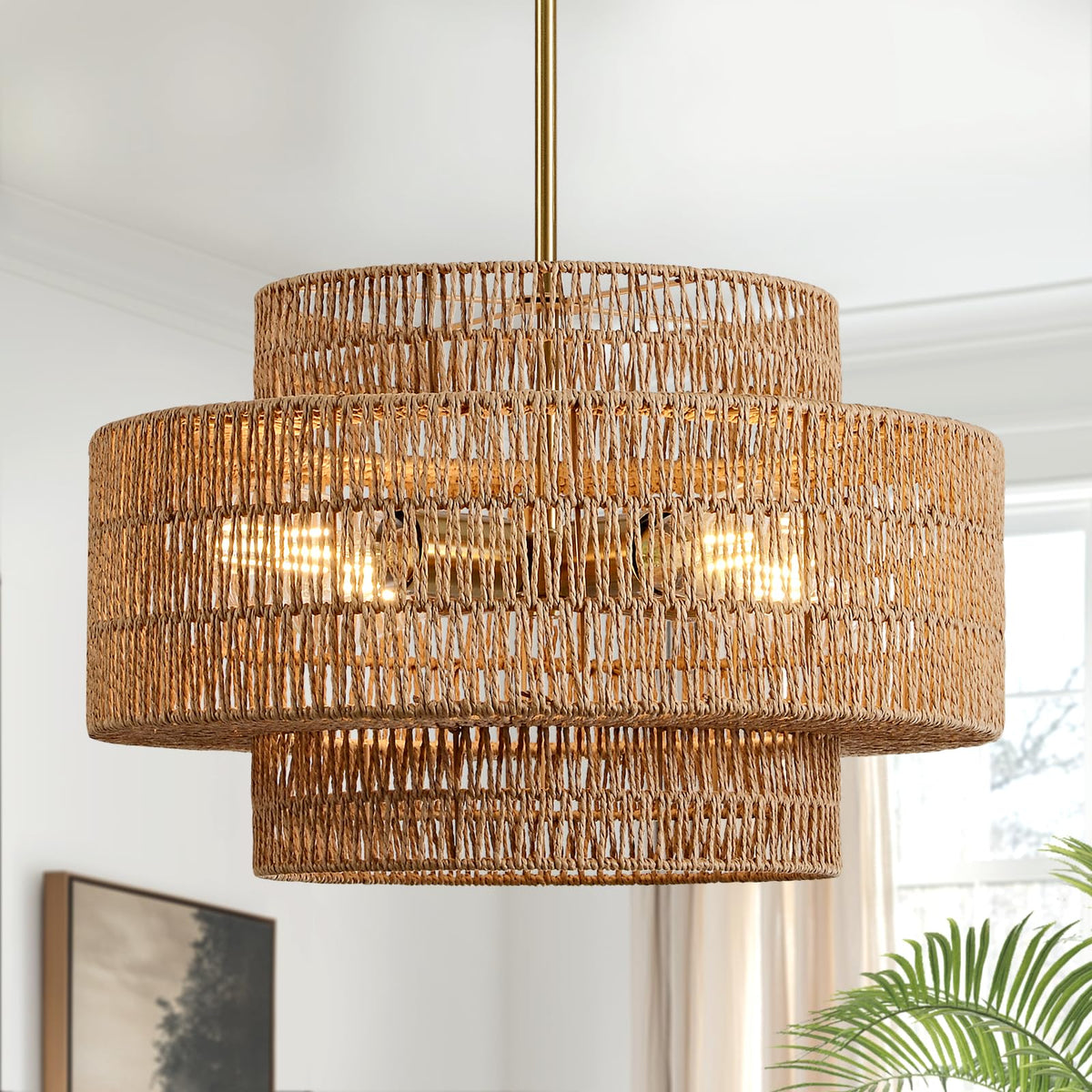 InterMaka boho rattan chandelier with drum shade creates warm dining ambiance