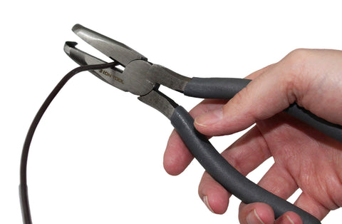 Ion Tool 7-inch angled needle nose pliers in use, versatile for shaping and twisting tasks.