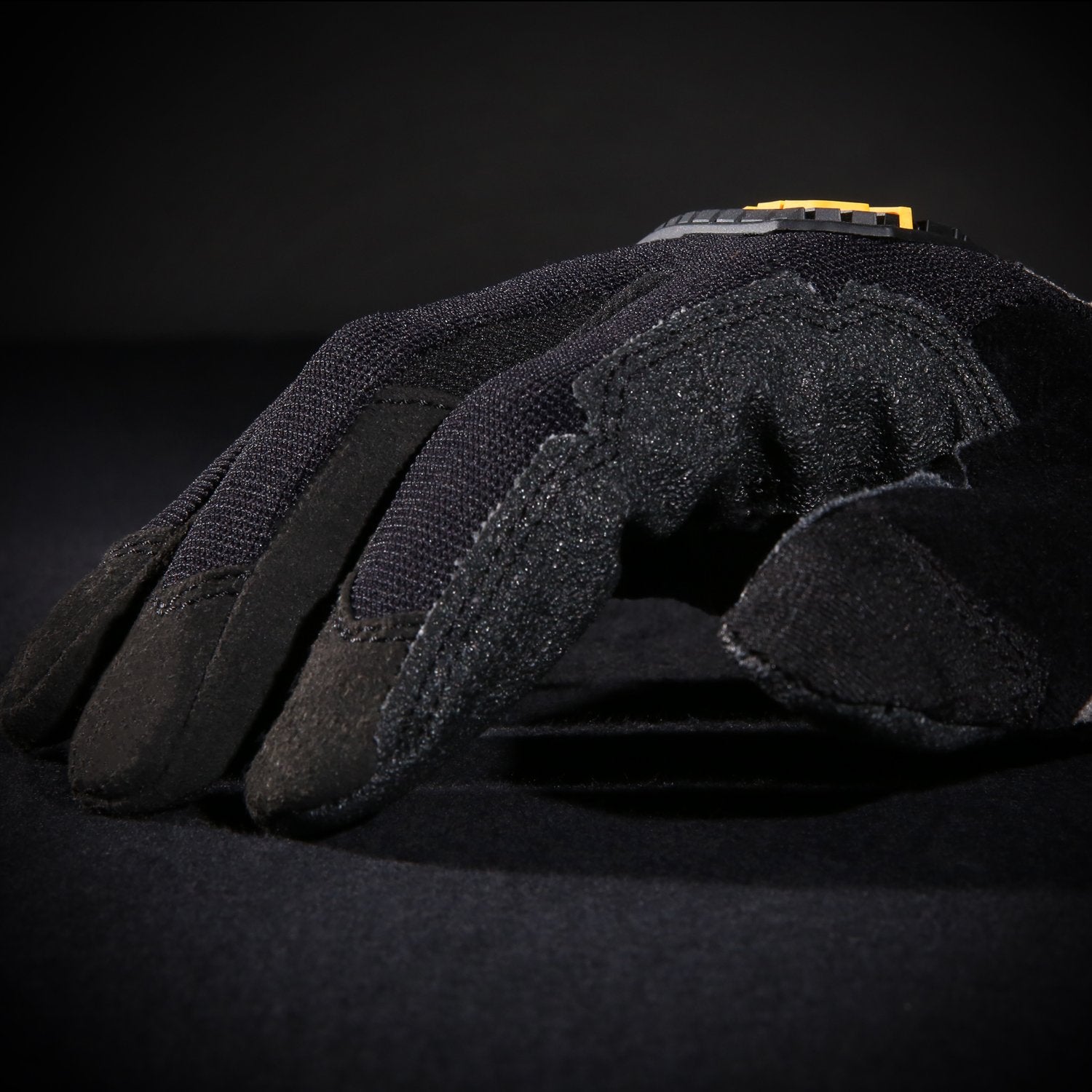 Ironclad HUG-03-M reinforced palm and fingers for long wear.