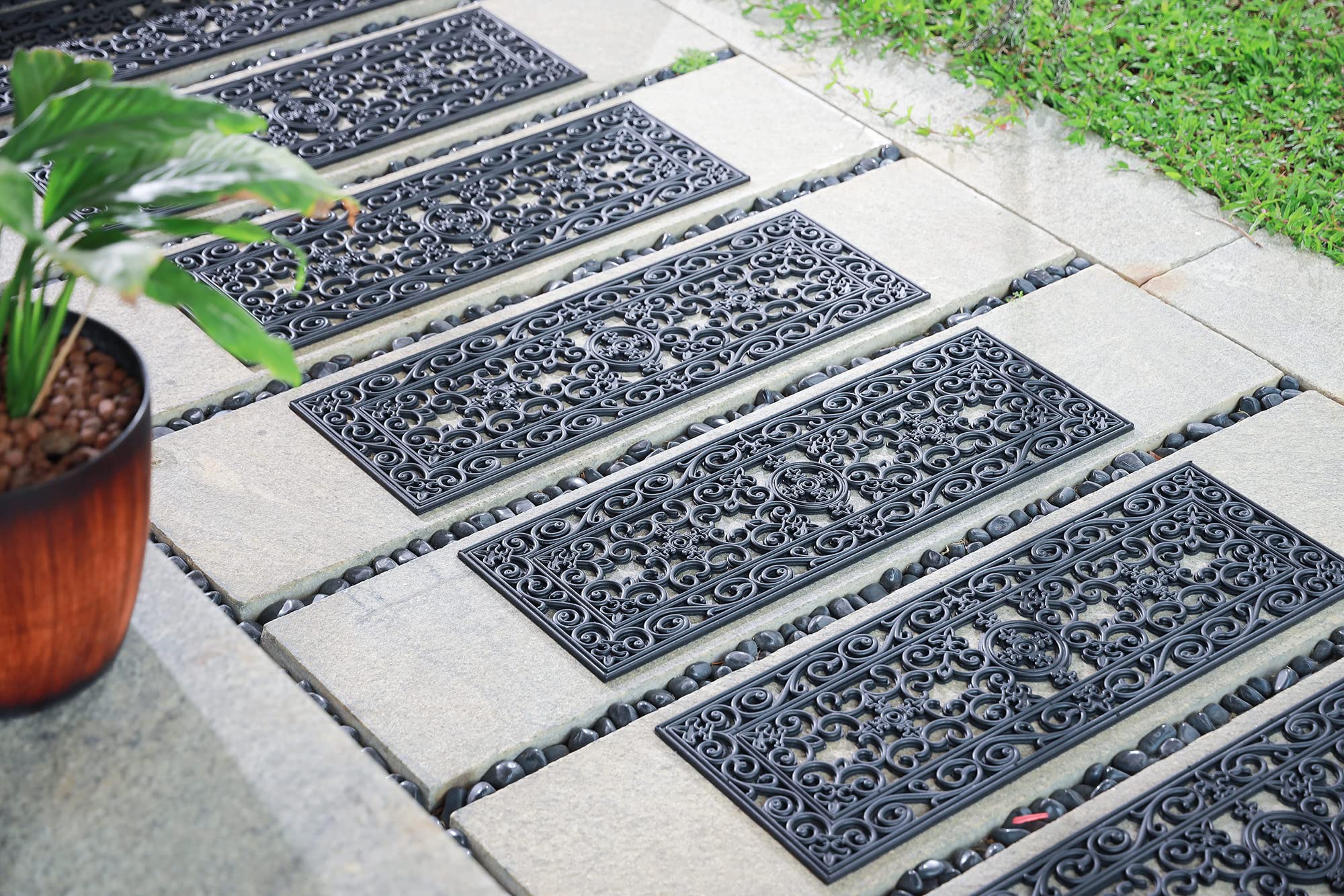 IRONGATE scrollwork design on treads adds classic style to stairs