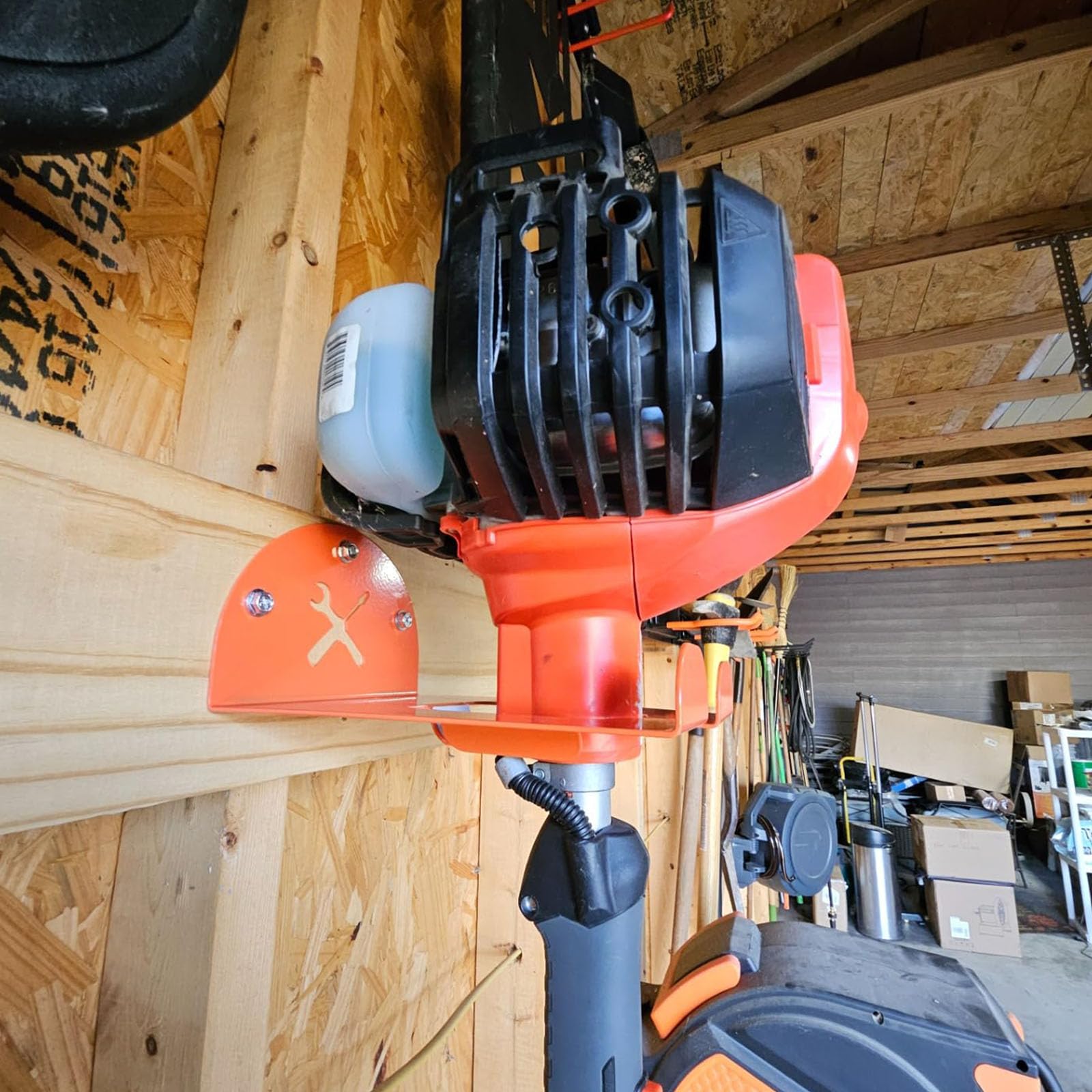 iulrtba space-saving rack keeps hedge trimmers and leaf blowers off the ground