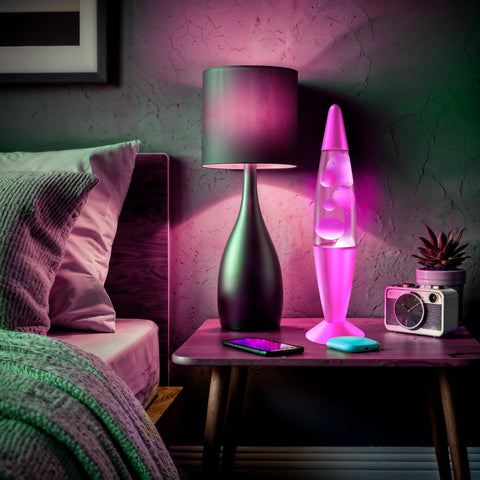 JAMBO desk lamp relaxes workspace with gentle ambient illumination.