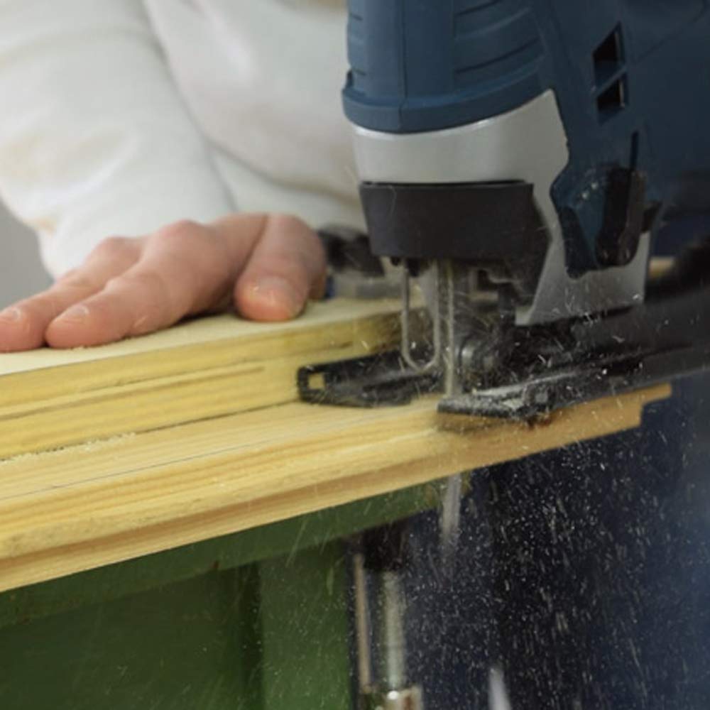 Janchi blades cutting softwood and chipboard with smooth results.