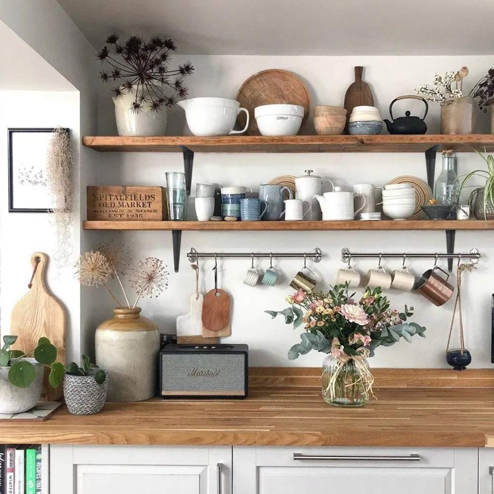 Janyang heavy-duty black iron brackets ideal for rustic wall shelves.