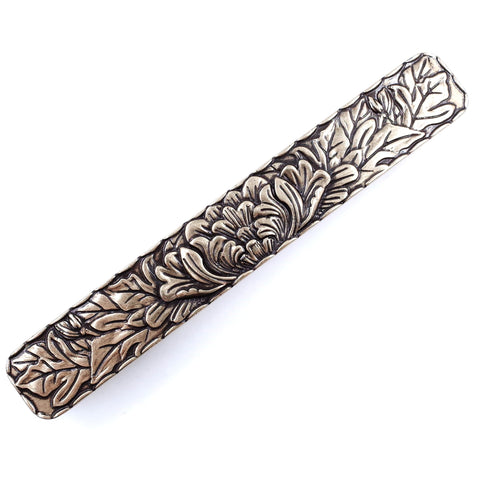Six-pack antique peony pulls provide easy, cohesive updates across multiple drawers.
