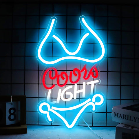 JFLLamp Bikini Crs Light neon sign glowing on wall in Azure, Red and White.
