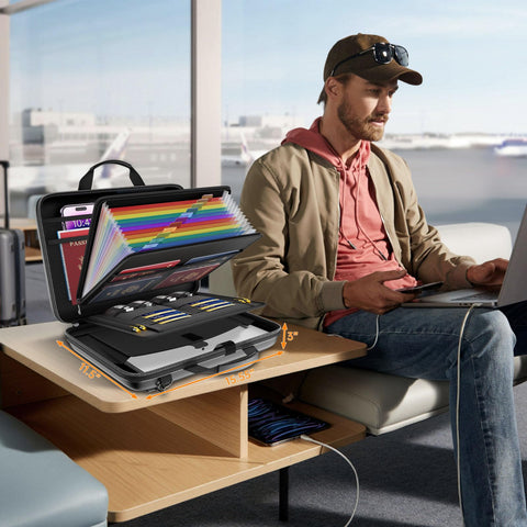JHSafer fireproof case beside a laptop demonstrating large capacity.