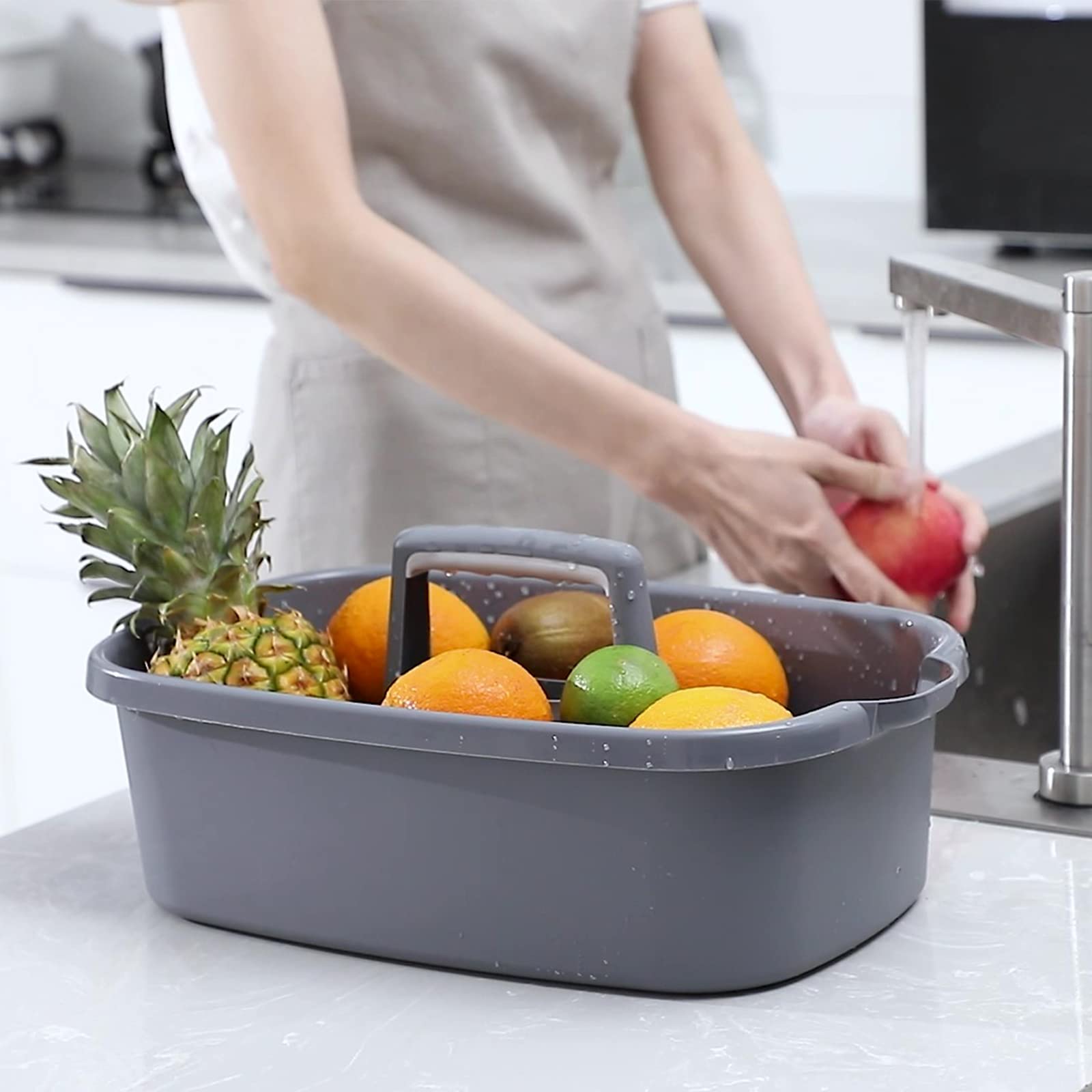 JiatuA plastic storage basket with handle holds cleaning supplies neatly.