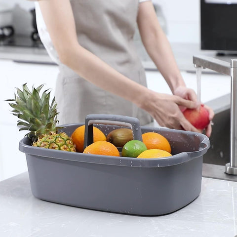 JiatuA plastic storage basket with handle holds cleaning supplies neatly.