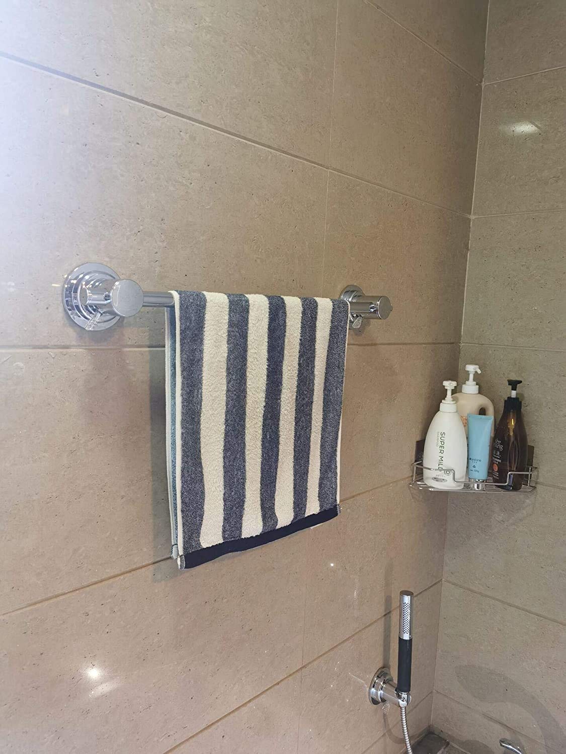 JiePai towel bar mounted on tile with adhesive disc for stability.