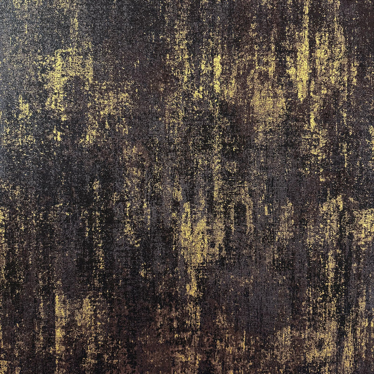 JiffDiff wallpaper roll close-up reveals black and gold metallic pattern for premium accents.