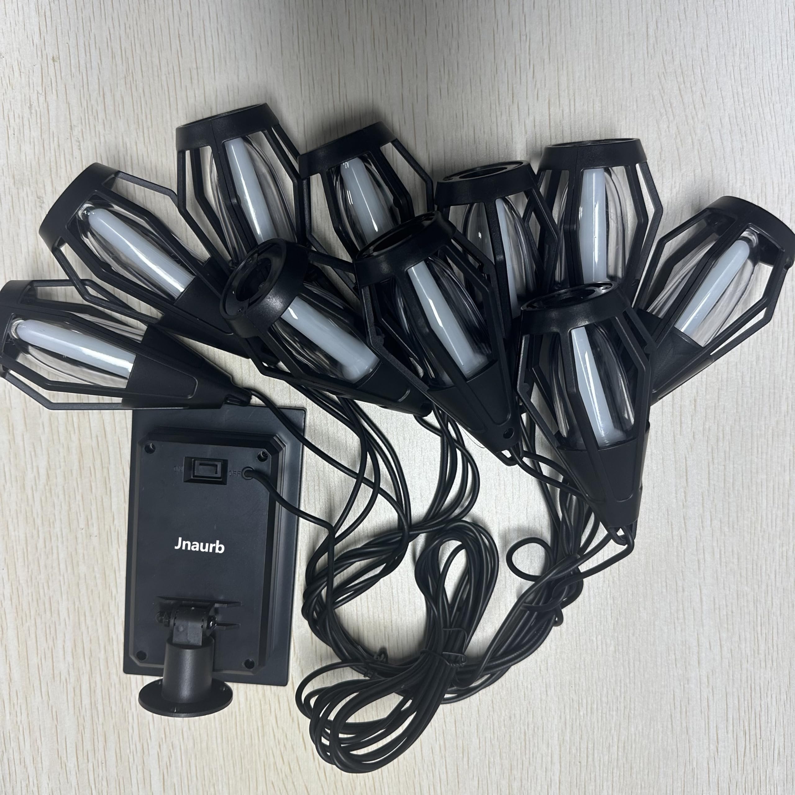 Jnaurb IP65 waterproof flame lights withstand rain for outdoor use.
