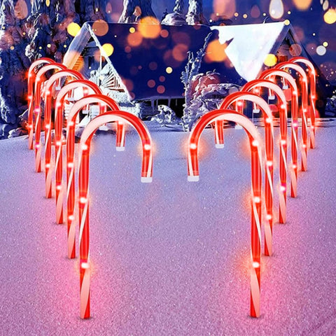 Joascher Christmas candy cane lights 10-pack illuminate outdoor walkways for festive curb appeal.