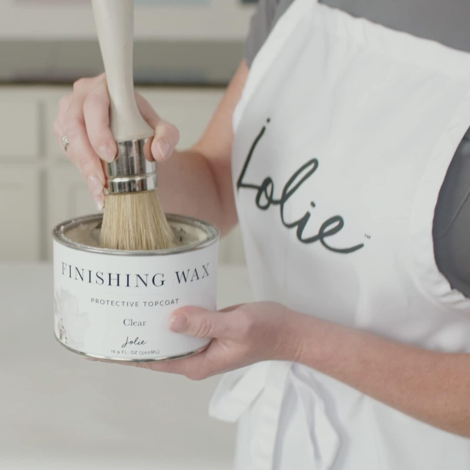 Jolie Clear Finishing Wax applied to wood surface for durable interior protection