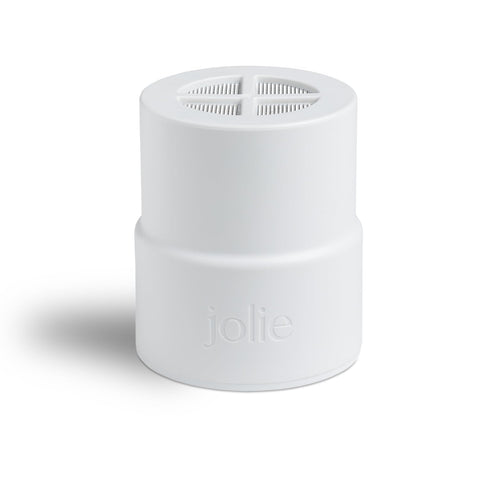 Jolie replacement filter installed in the showerhead neck for easy maintenance and clean water