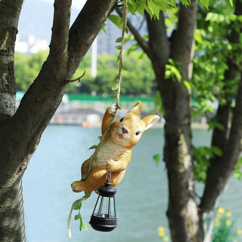 Joliyoou outdoor bunny figurine is waterproof for year round decoration.