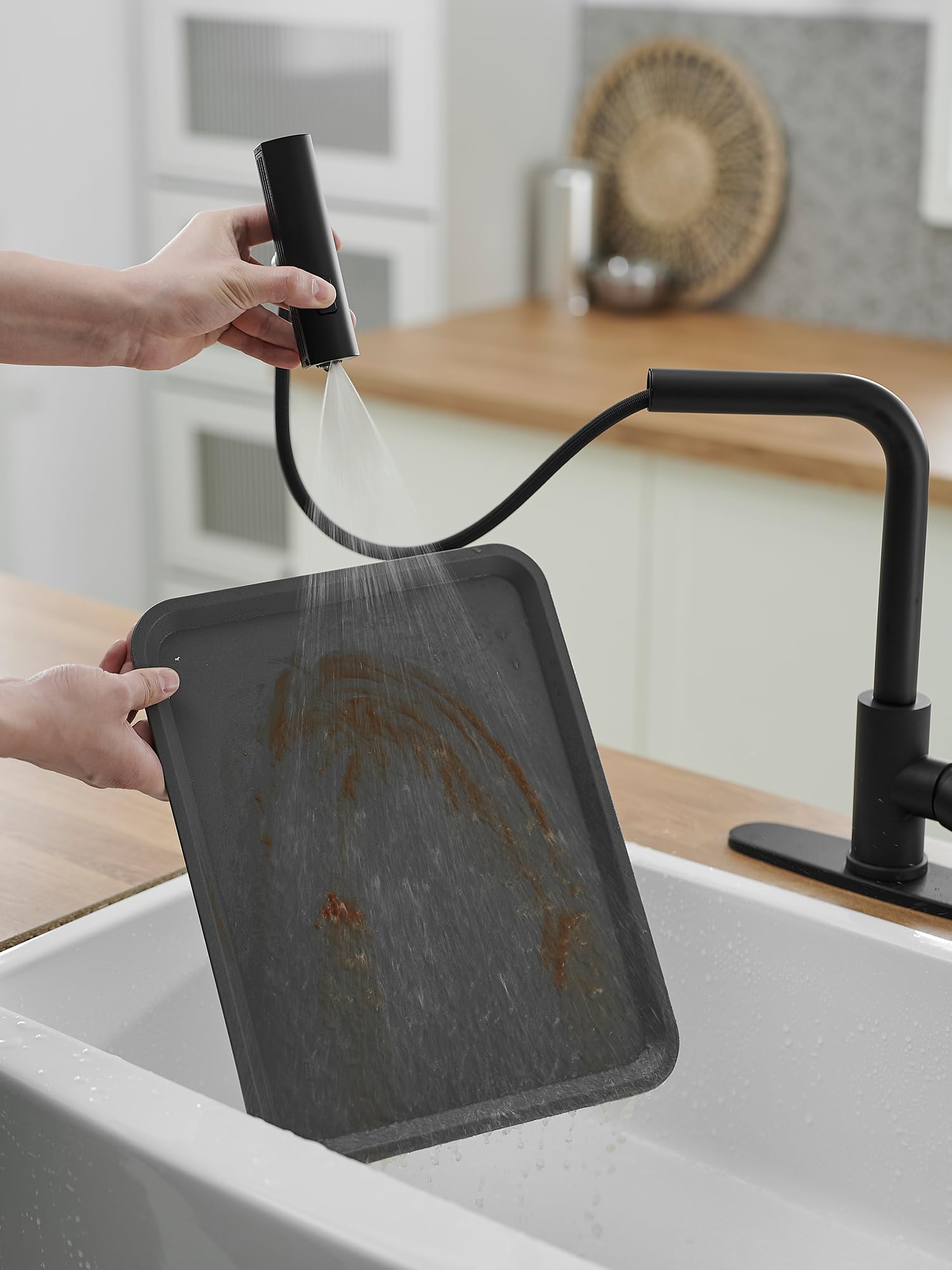 JOOM retractable PEX hose extends to reach more of the sink area.