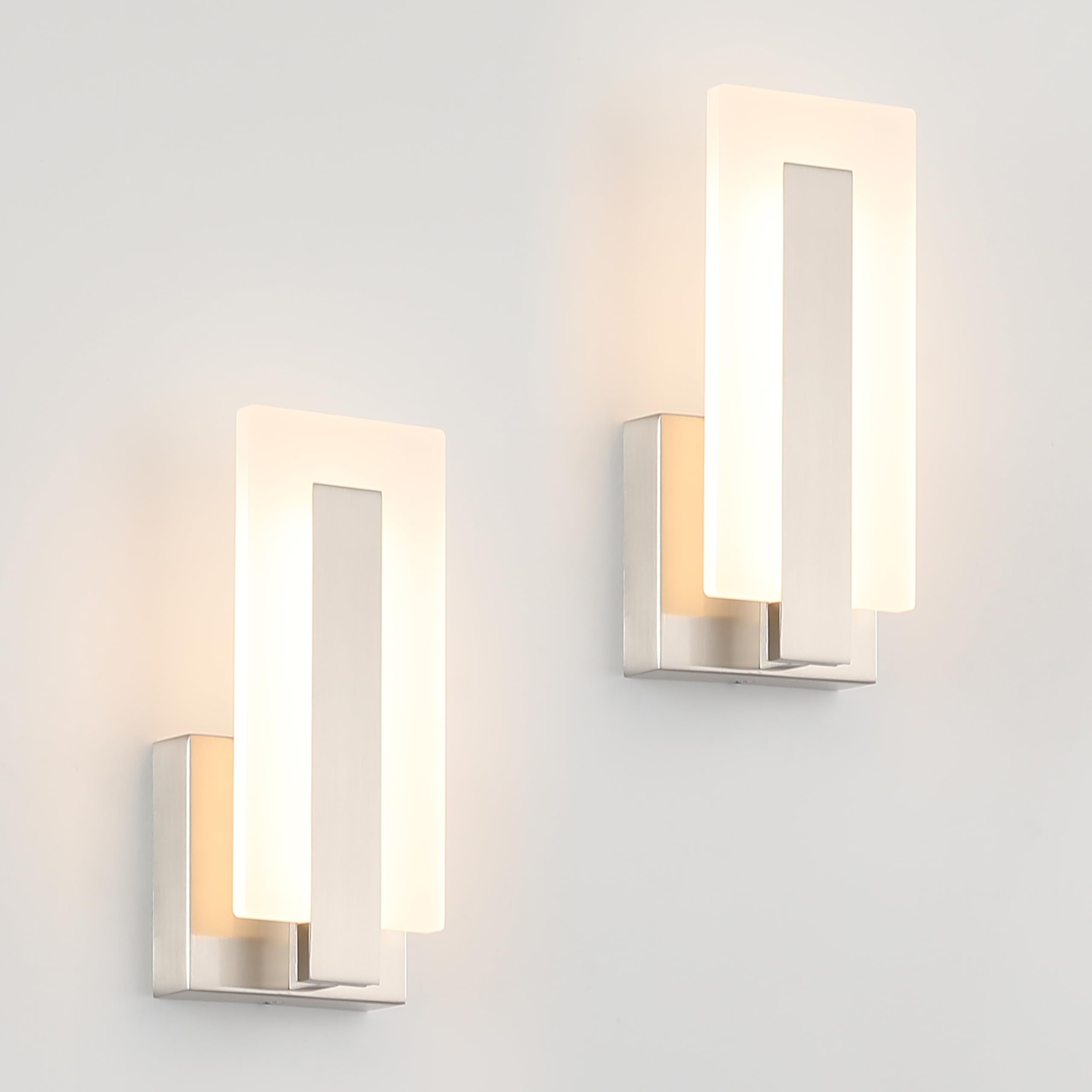 Joosenhouse LED wall sconce set in brushed nickel brightens hallways with warm, dimmable illumination.