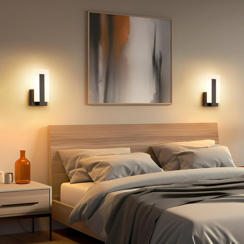 Joosenhouse wall sconce metal black acrylic shade delivers soft light.