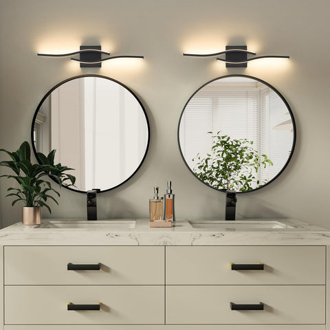 Joossnwell 23-inch black fixture installed flush over mirror in a modern bathroom.